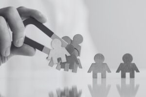 Hiring manager holding magnet for talent attraction