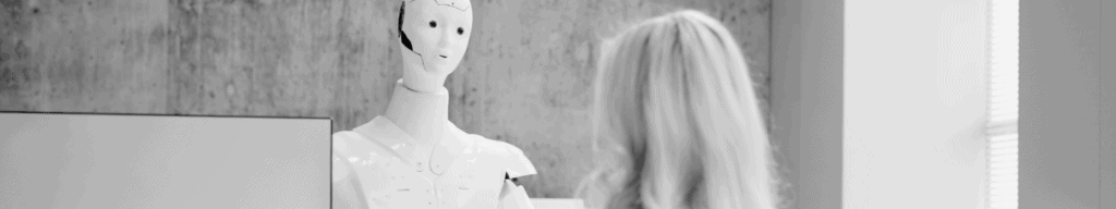 Automated robot staring at candidate from across desk during an interview